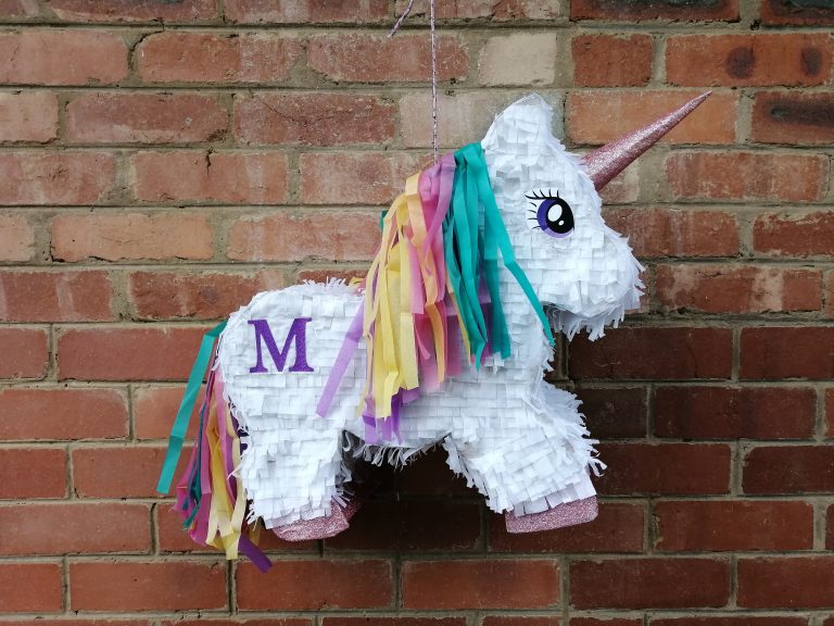 Rainbow unicorn pinata made by propnpinata