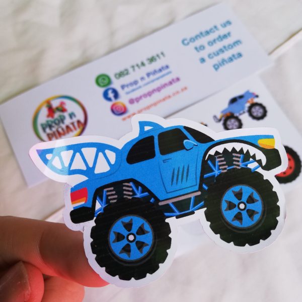 sticker of a blue shark monster truck